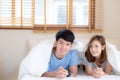 Beautiful portrait young asian couple relax and satisfied together in bedroom at home Royalty Free Stock Photo