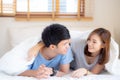 Beautiful portrait young asian couple relax and satisfied together in bedroom at home Royalty Free Stock Photo