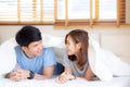 Beautiful portrait young asian couple relax and satisfied together in bedroom at home Royalty Free Stock Photo