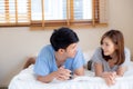 Beautiful portrait young asian couple relax and satisfied together in bedroom at home Royalty Free Stock Photo