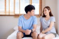 Beautiful portrait young asian couple relax and satisfied together in bedroom at home Royalty Free Stock Photo