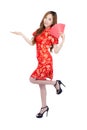 Beautiful portrait young asian woman cheongsam dress smiling presenting and holding red envelope on white background