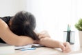 Beautiful portrait young asian woman learning exam or homework and sleep with tired and stress Royalty Free Stock Photo