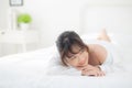 Beautiful portrait young asian woman lying and smile while wake up with sunrise at morning, beauty cute girl happy and cheerful