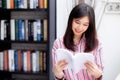 Beautiful of portrait young asian woman relax sitting reading bo Royalty Free Stock Photo