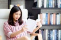 Beautiful of portrait young asian woman relax sitting reading bo Royalty Free Stock Photo