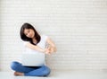 Beautiful portrait young asian woman sitting with laptop stretch Royalty Free Stock Photo