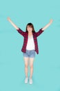 Beautiful portrait young asian woman smiling confident and excited summer holiday isolated blue background Royalty Free Stock Photo