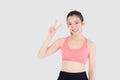 Beautiful portrait young asian woman in sport clothes with satisfied and confident gesture finger v sign isolated