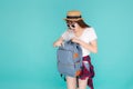 Beautiful portrait young asian woman wear sunglasses and hat open backpack and surprise travel summer trip. Royalty Free Stock Photo