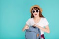 Beautiful portrait young asian woman wear sunglasses and hat open backpack and surprise travel summer trip holiday Royalty Free Stock Photo