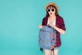 Beautiful portrait young asian woman wear sunglasses and hat open backpack and surprise travel summer trip Royalty Free Stock Photo