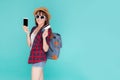 Beautiful portrait young asian woman wear travel summer fashion holding credit card and smart mobile phone.