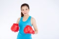 Beautiful portrait young asian woman wearing red boxing gloves with strength and strength isolated on white background, girl Royalty Free Stock Photo