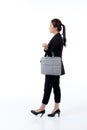 Beautiful portrait young business asian woman holding a briefcase isolated. Royalty Free Stock Photo