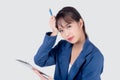 Beautiful portrait young business asian woman holding clipboard with worry and stressed about trouble of work. Royalty Free Stock Photo