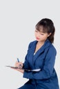 Beautiful portrait young business asian woman thinking and writing on clipboard for success isolated on white background. Royalty Free Stock Photo