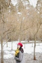 beautiful portrait of a young woman with mimosa flowers outdoors. Royalty Free Stock Photo