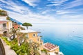 Beautiful Positano on hills leading down to coast, comfortable hotels and azure sea on Amalfi Coast in Campania, Italy