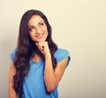 Beautiful positive young happy woman with hand under the face th Royalty Free Stock Photo