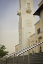 the beautiful potrait view of mosque with minaret and stairs at cairo