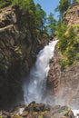 Beautiful waterfall in a wood on the Italian Dolomites Royalty Free Stock Photo