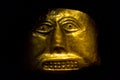 Golden Pre-Columbian mask displayed at the Gold Museum, Bogota, Colombia