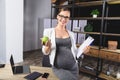 Pregnant mature businesswoman working at office Royalty Free Stock Photo