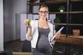 Pregnant mature businesswoman working at office Royalty Free Stock Photo