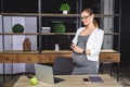 Pregnant businesswoman. Pregnant mature businesswoman working at office Royalty Free Stock Photo