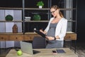 Pregnant businesswoman. Pregnant mature businesswoman working at office Royalty Free Stock Photo