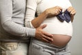 Beautiful pregnant couple hugging and smiling. Love and tenderness. The happiness of waiting. Close-up Royalty Free Stock Photo