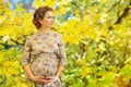 Pregnant female in autumn Royalty Free Stock Photo