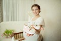 Beautiful pregnant female at home look at the camera Royalty Free Stock Photo