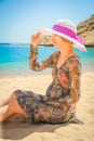 Beautiful pregnant girl in hat at sea background Royalty Free Stock Photo