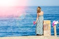 Beautiful pregnant girl in hat at sea background Royalty Free Stock Photo