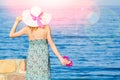 Beautiful pregnant girl in hat at sea background Royalty Free Stock Photo