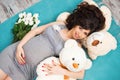 Beautiful pregnant mother with teddy bears. Motherhood Royalty Free Stock Photo