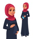 Beautiful pregnant Muslim woman in hijab