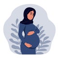 Beautiful pregnant Muslim woman hugs her belly. Healthy pregnancy banner. The concept of pregnancy and motherhood