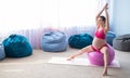 Beautiful pregnant woman doing exercises on a fitness ball. Expectant mother in the last trimester doing yoga. Royalty Free Stock Photo