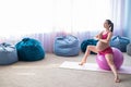 Beautiful pregnant woman doing exercises on a fitness ball. Expectant mother in the last trimester doing yoga. Royalty Free Stock Photo