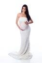 Beautiful Pregnant Woman Draped in White