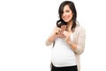 Beautiful pregnant woman eating a chocolate bar Royalty Free Stock Photo