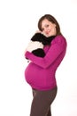 Beautiful pregnant woman embrace toy - isolated over a white background