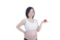 Beautiful pregnant woman with fresh tomato Royalty Free Stock Photo