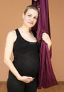 Beautiful pregnant woman with hammock
