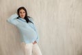 Beautiful pregnant woman portrait genera family happiness