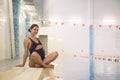 beautiful pregnant woman posing near the pool Royalty Free Stock Photo