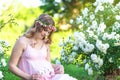 Beautiful pregnant woman relaxing outside Royalty Free Stock Photo